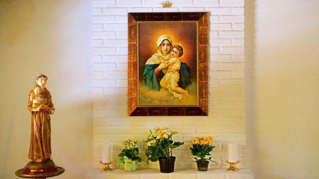 Chapel of Our Lady Desatanudos featuring art, flowers and religious aspects