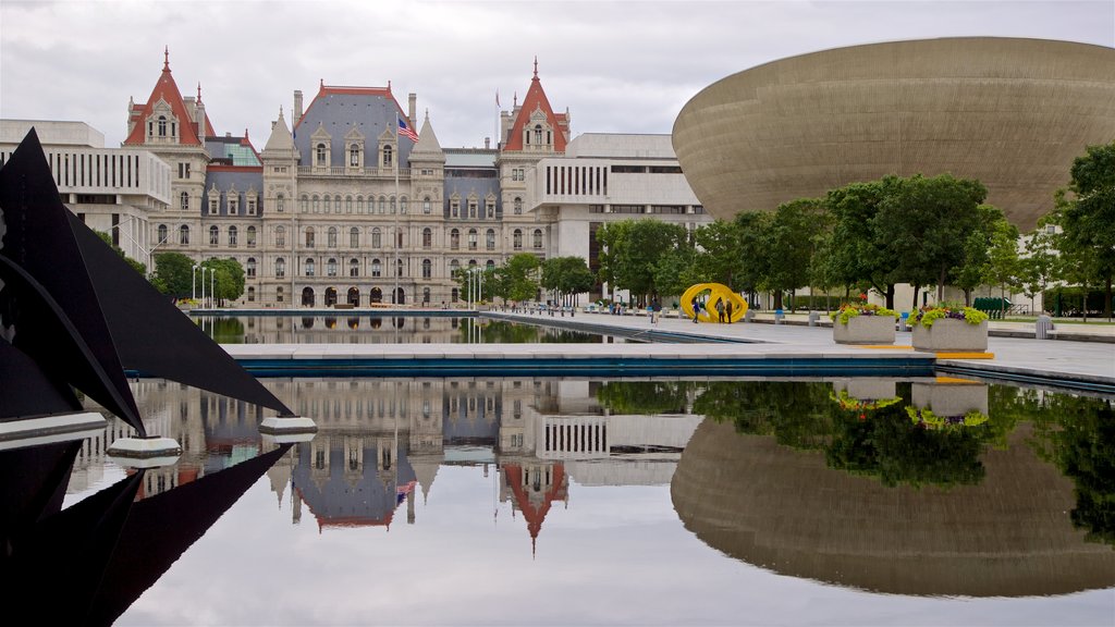 The Egg featuring heritage architecture and a pond