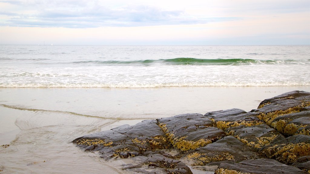 Mother\'s Beach showing a sandy beach, general coastal views and rugged coastline