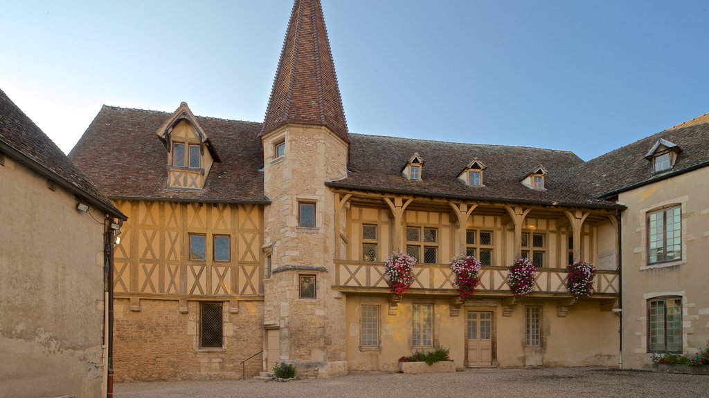 Burgundy Wine Museum featuring flowers and heritage architecture