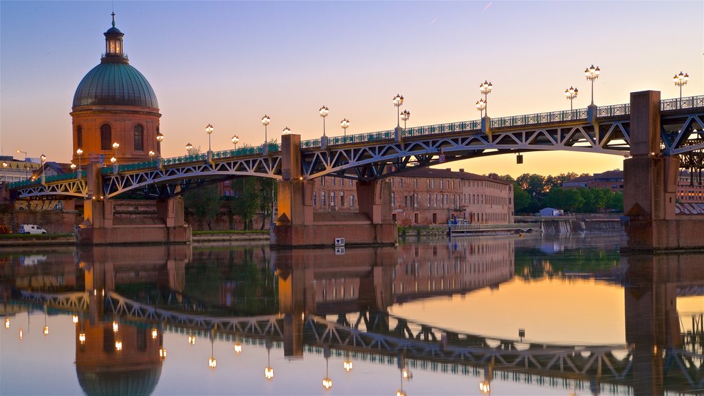 Garonne which includes a sunset, heritage architecture and a river or creek