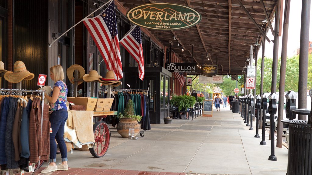 Old Market showing signage as well as an individual female