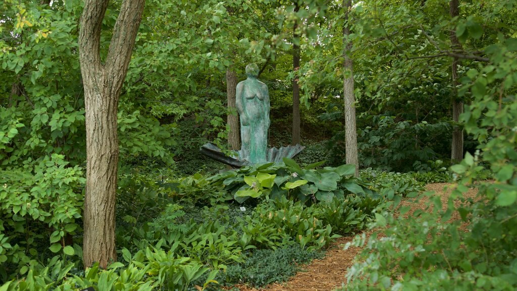 Lauritzen Gardens which includes outdoor art, a park and a statue or sculpture