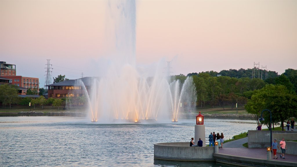 Heartland of America Park featuring a sunset, a lake or waterhole and a fountain