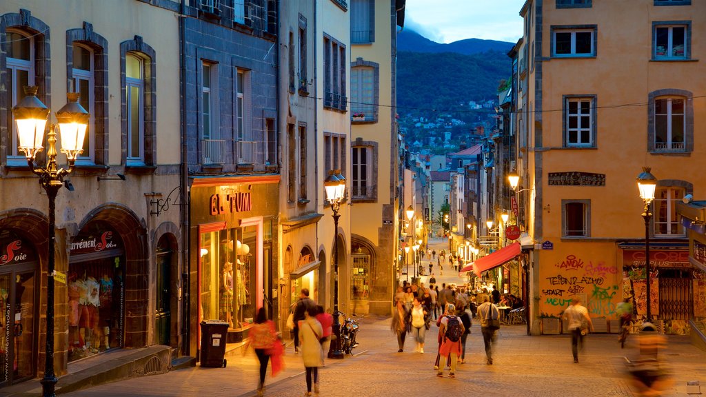 Clermont-Ferrand which includes a city, night scenes and street scenes