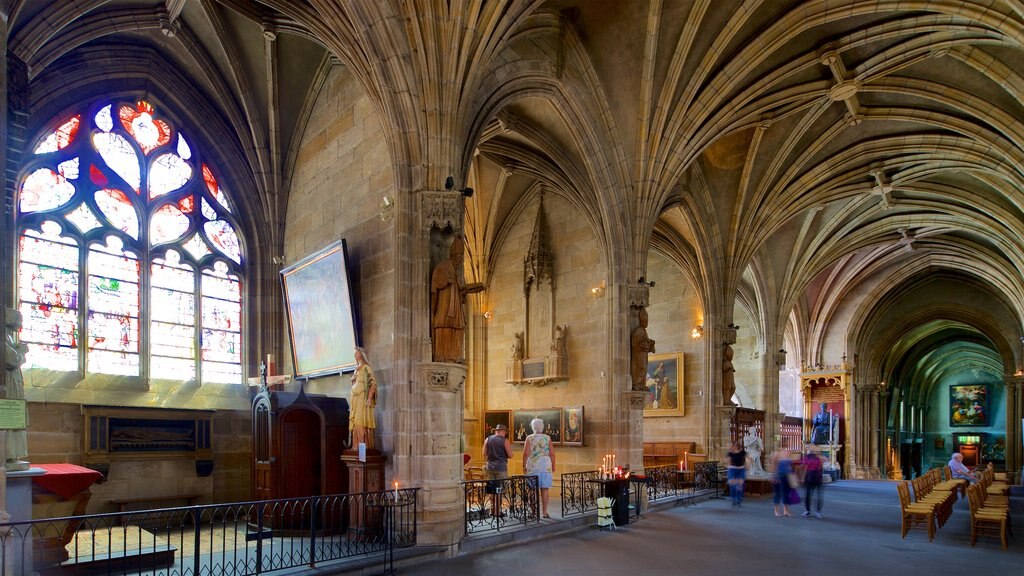 Moulins Cathedral featuring a church or cathedral, heritage elements and interior views