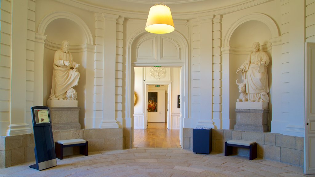 Musée des Beaux Arts featuring a statue or sculpture and interior views