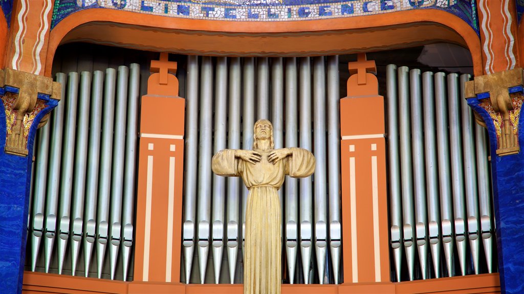 Église St-Blaise mostrando una estatua o escultura y aspectos religiosos