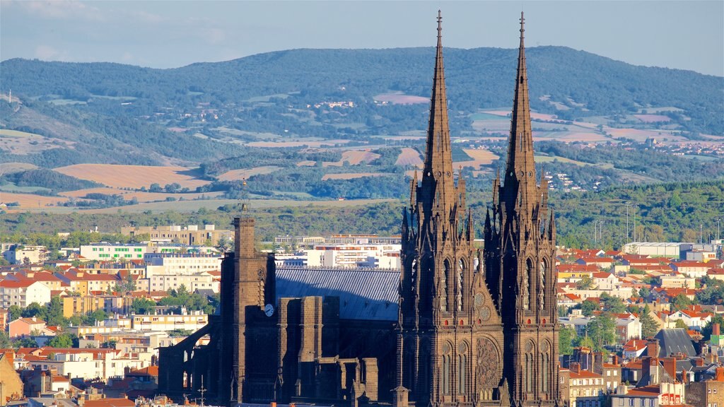 Montjuzet Park featuring heritage architecture, landscape views and a city