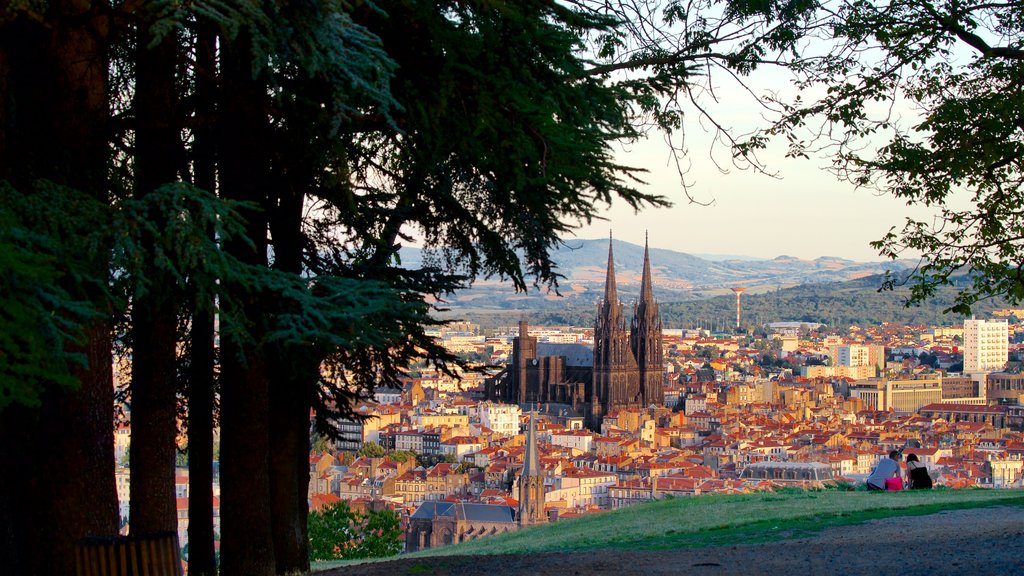 Montjuzet Park which includes heritage architecture, a city and a church or cathedral