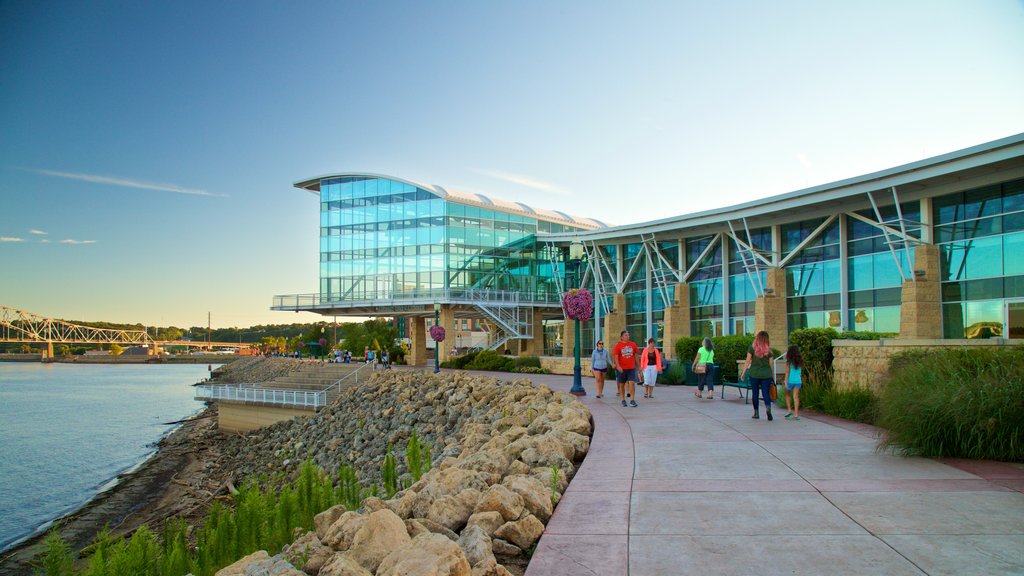 Dubuque showing a sunset, a river or creek and modern architecture