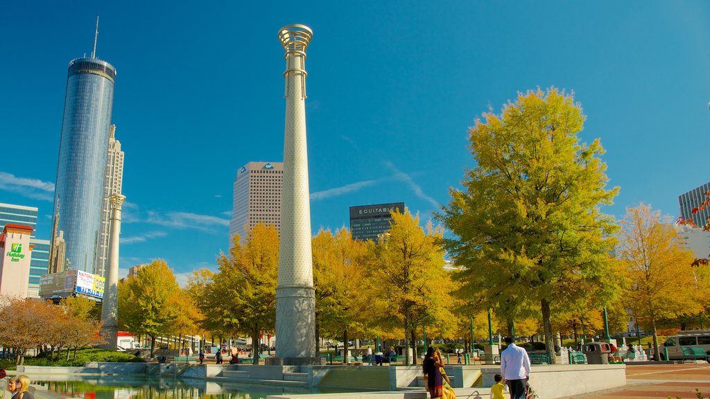 Parque Olímpico del Centenario ofreciendo un monumento, un rascacielos y una ciudad