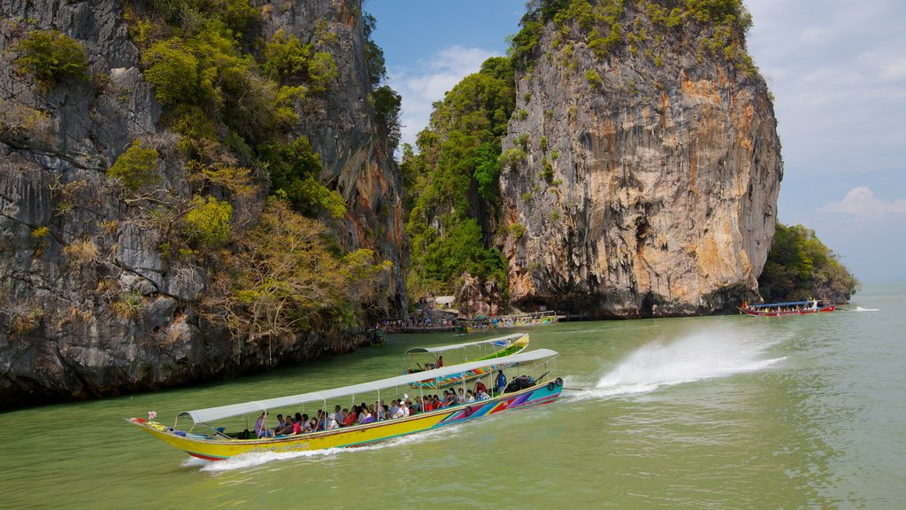 Ao Phang Nga National Park which includes rocky coastline, tropical scenes and boating