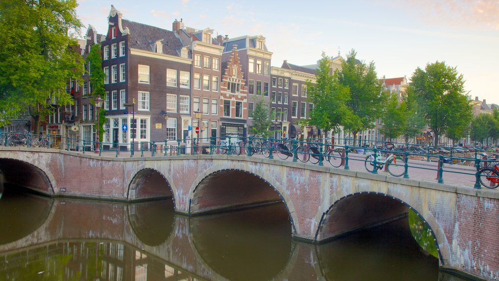 Canal Ring which includes a bridge, street scenes and a small town or village