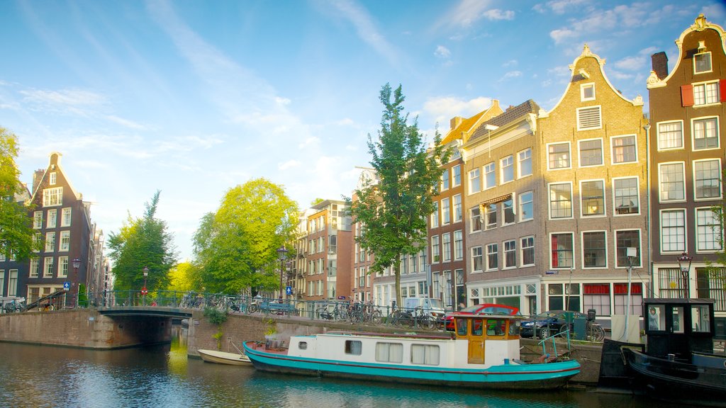 Canal Ring which includes heritage architecture, a city and boating