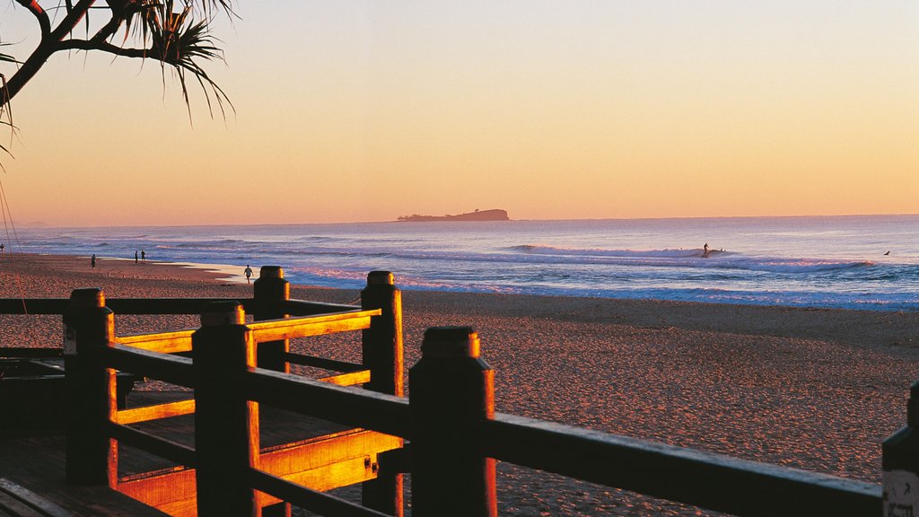 Maroochydore which includes a sandy beach and a sunset