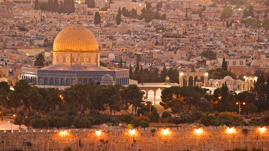 Temple Mount featuring a city, landscape views and a sunset