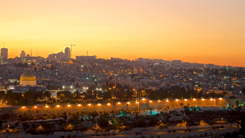 Temple Mount showing landscape views, a city and a sunset