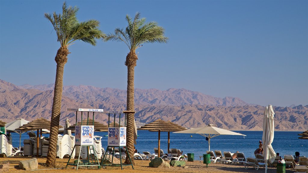 Green Beach which includes general coastal views and a beach