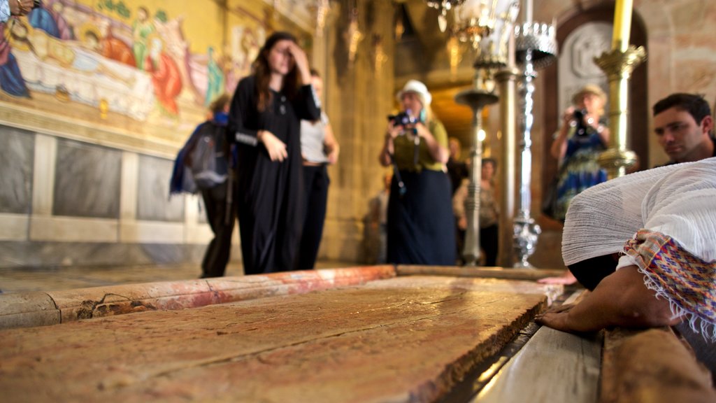 Church of the Holy Sepulchre featuring interior views, heritage elements and a church or cathedral