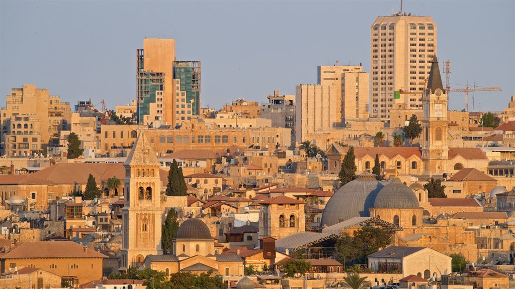 Mount of Olives which includes a city, landscape views and a sunset