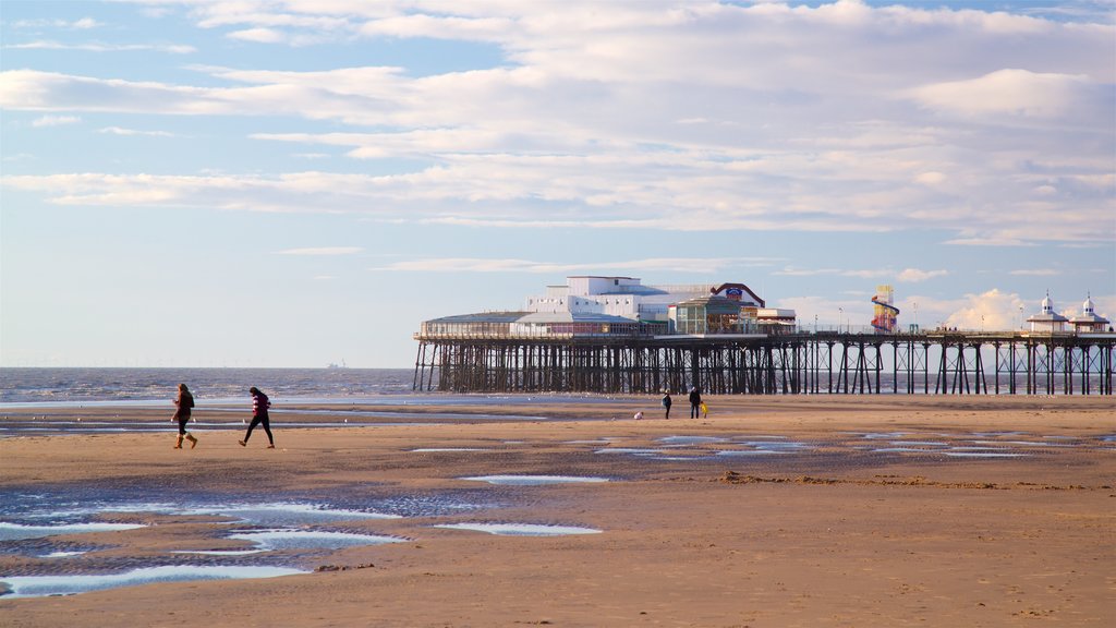 Blackpool Beach featuring a beach and general coastal views as well as a couple