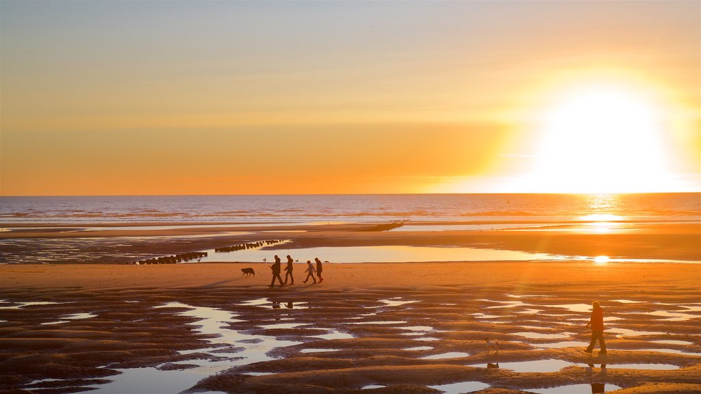 Central Beach which includes general coastal views, a sunset and landscape views