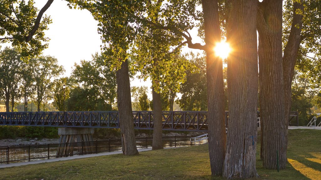 Mishawaka which includes a river or creek, a sunset and a park