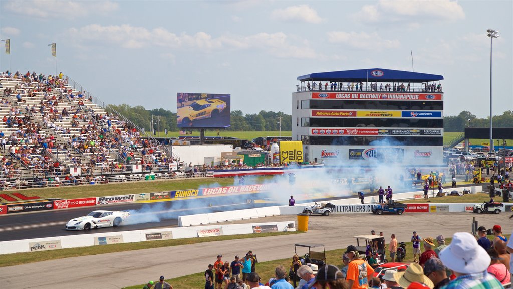 Lucas Oil Raceway as well as a large group of people