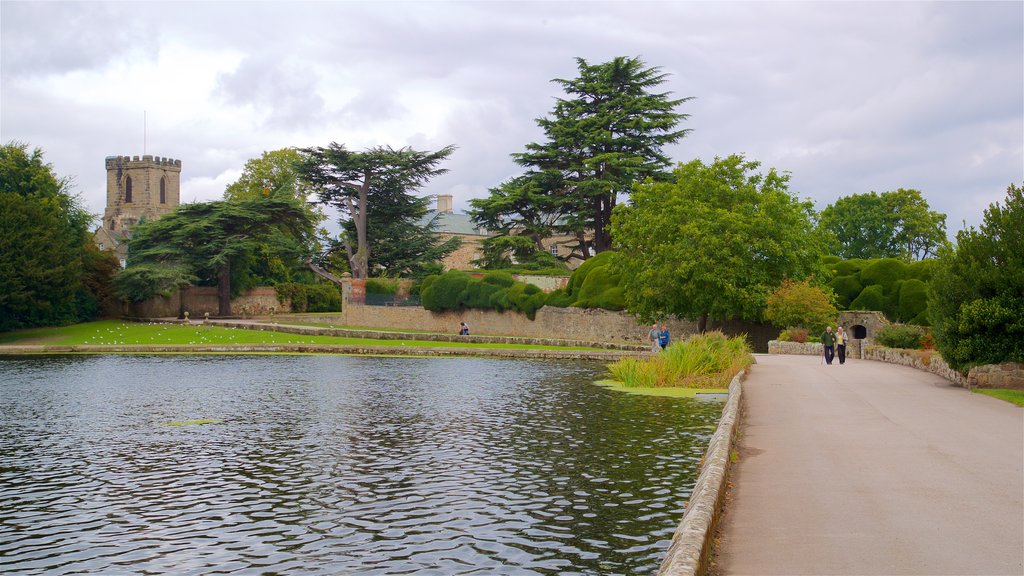 Melbourne showing a pond, a garden and a small town or village