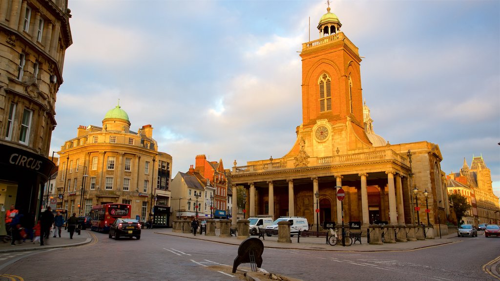 All Saints Church showing heritage architecture and a sunset