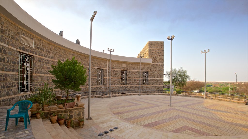 Gawr as-Safi featuring a square or plaza and a sunset