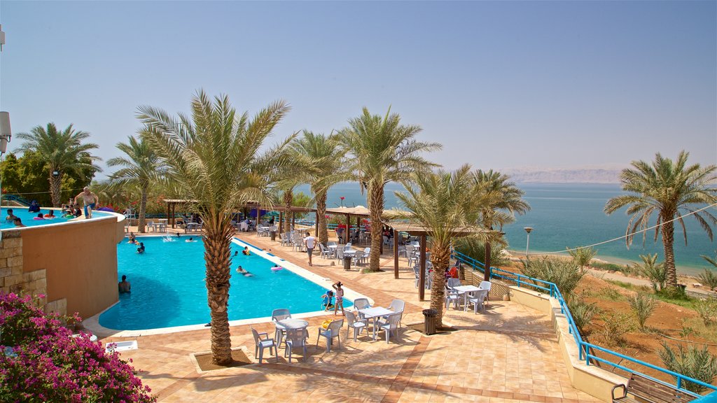 Sweimeh featuring a pool, swimming and general coastal views