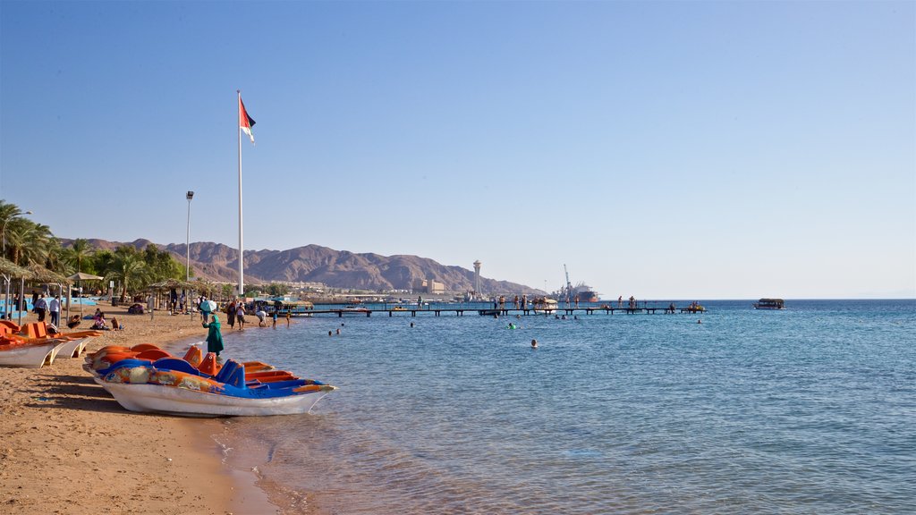 Aqaba showing a beach and general coastal views