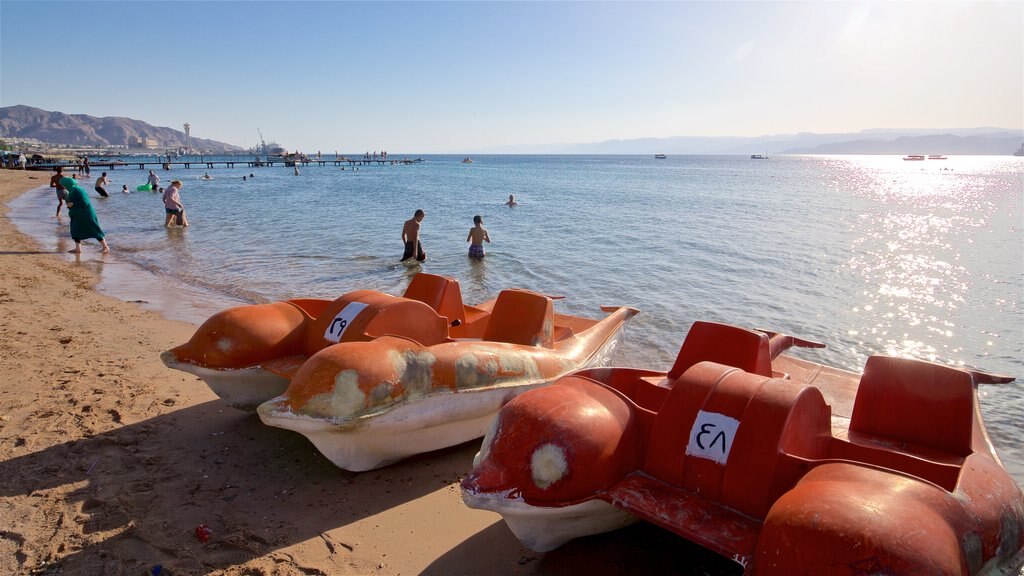 Aqaba which includes a sandy beach, swimming and general coastal views