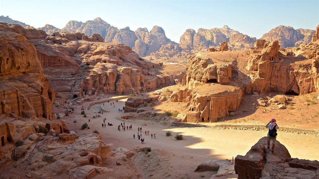 Petra which includes landscape views, building ruins and a gorge or canyon