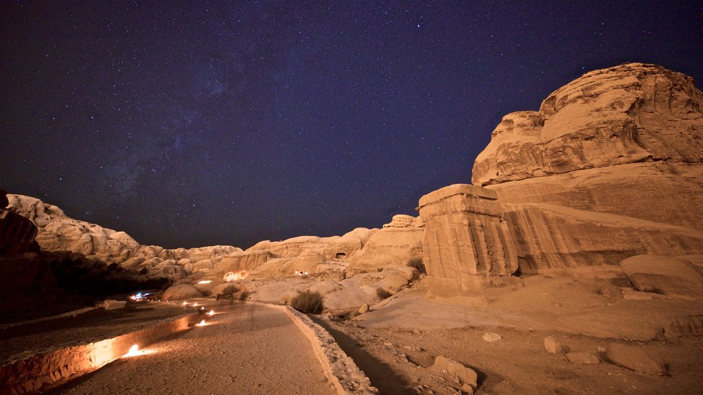 Wadi Musa showing night scenes, landscape views and a gorge or canyon