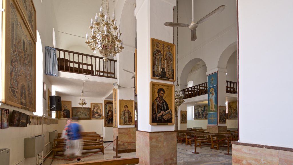 Basilica of Saint George showing a church or cathedral, religious aspects and interior views