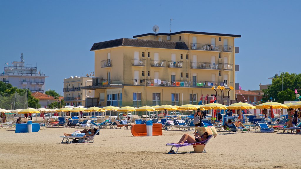 Viserbella which includes general coastal views, a beach and a coastal town