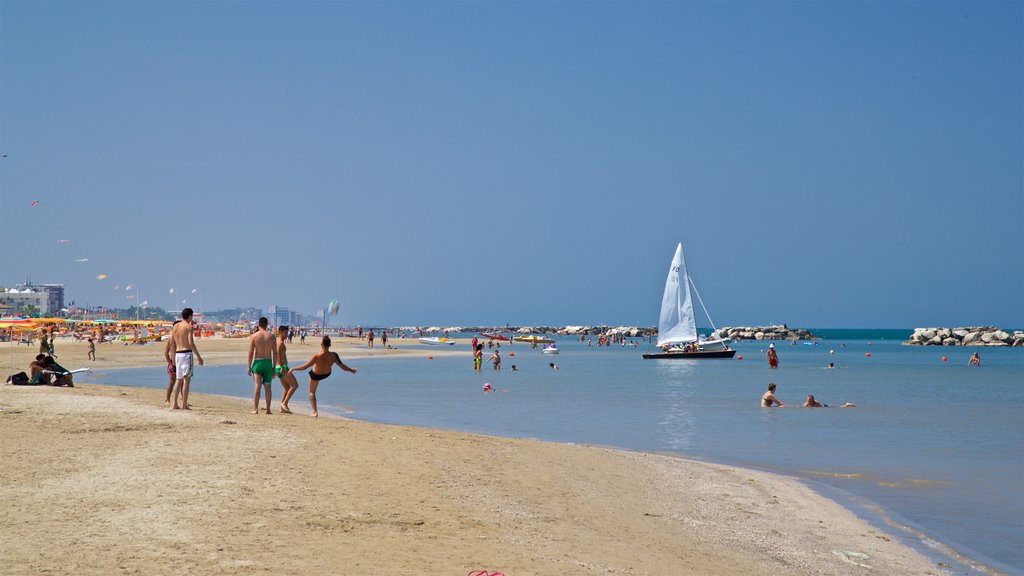 Viserbella showing general coastal views, swimming and a sandy beach