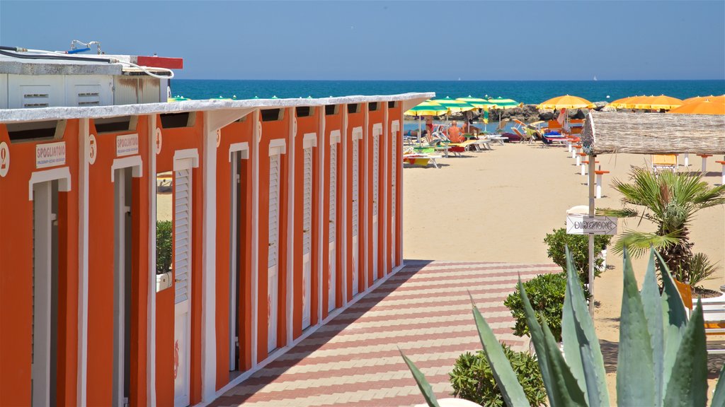 Torre Pedrera which includes a beach and general coastal views