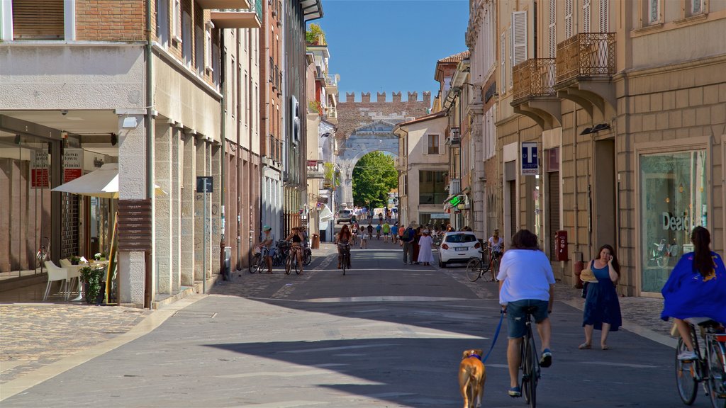 Piazza Tre Martiri showing cycling