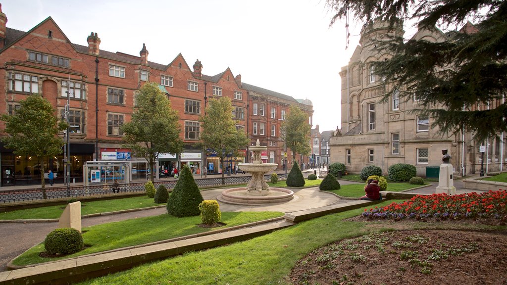 Wolverhampton que incluye arquitectura patrimonial, un parque y una fuente