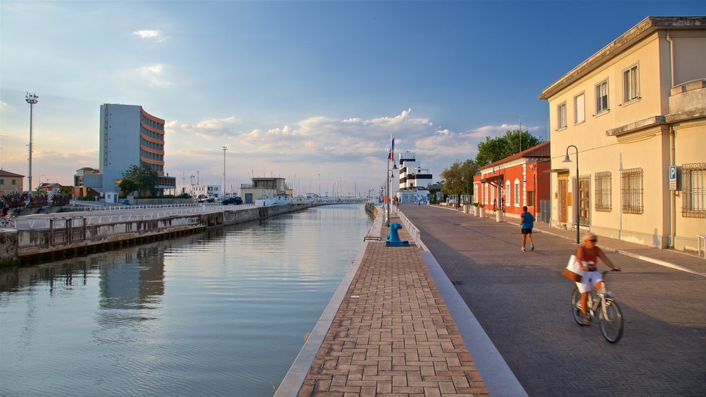 Senigallia showing a sunset and a river or creek