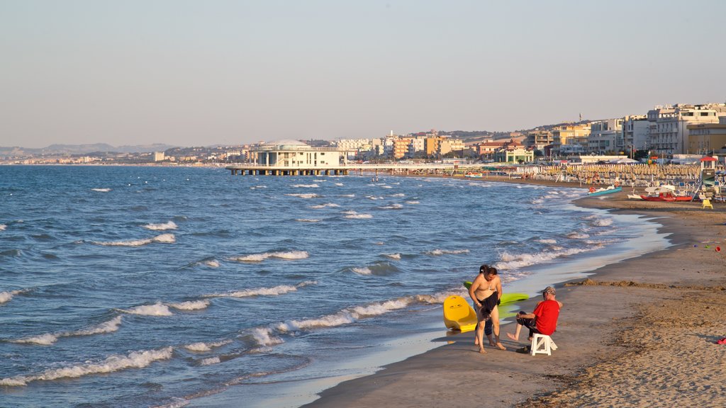 Senigallia showing general coastal views, a coastal town and a beach