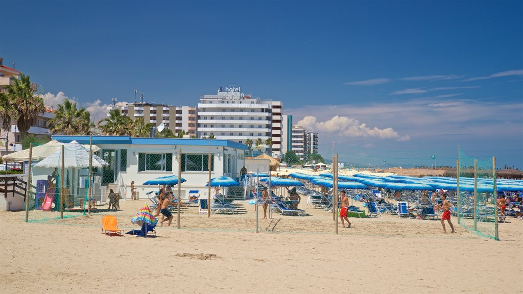 Montesilvano showing a coastal town, a sandy beach and general coastal views