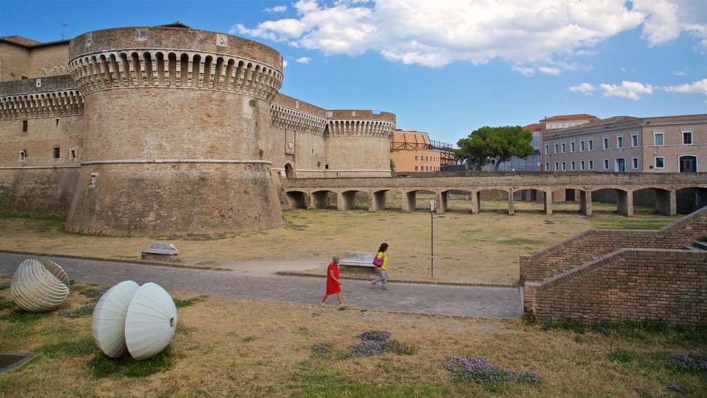 Rocca Roveresca di Senigallia showing heritage architecture and a castle as well as a couple