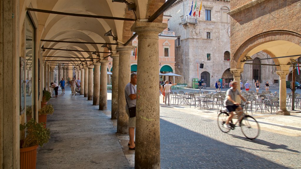 Piazza del Popolo showing street scenes as well as a small group of people