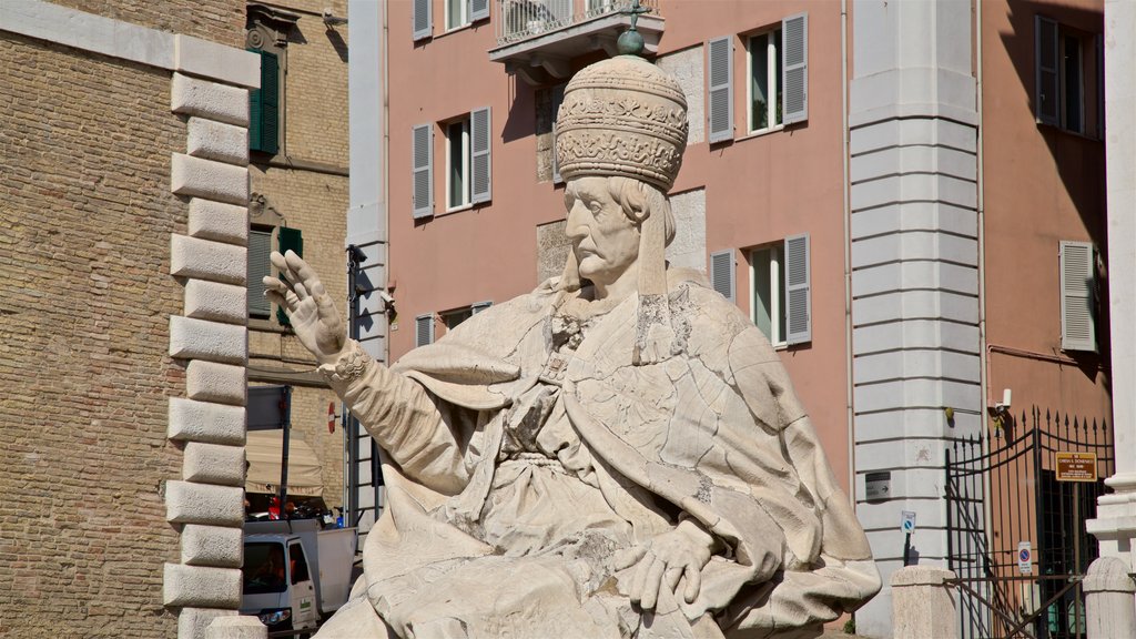 Piazza del Plebiscito featuring a statue or sculpture and religious aspects