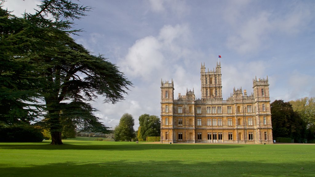 Highclere Castle showing heritage architecture, a garden and a house